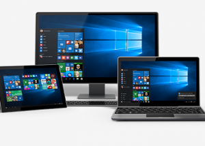 Laptop computer, desktop computer, and tablet with Windows 10 on their screens