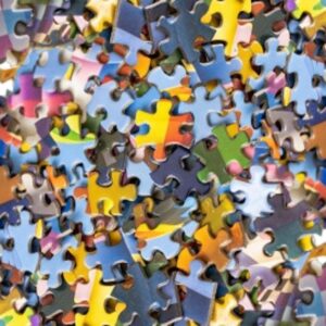 Pile of multicolored jigsaw pieces