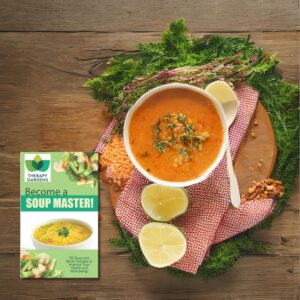 White bowl of lentil soup on a dark wooden table