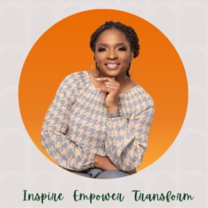 Dark skinned woman in grey checked shirt on an orange background with the words inspire, empower, transform below her