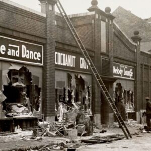 Black and white photo of a historical burned out storefront